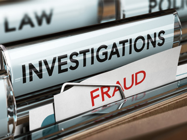 2 books are shown with one book titled Law and the other titled Investigations in a folder bin titled Fraud.